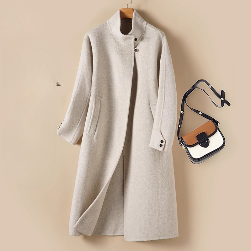 Long wool coat made of premium wool with modern collar cutout