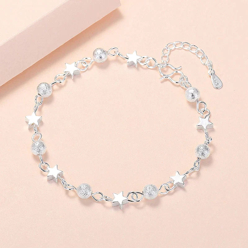 Damen Armband mit Sternenanhängern