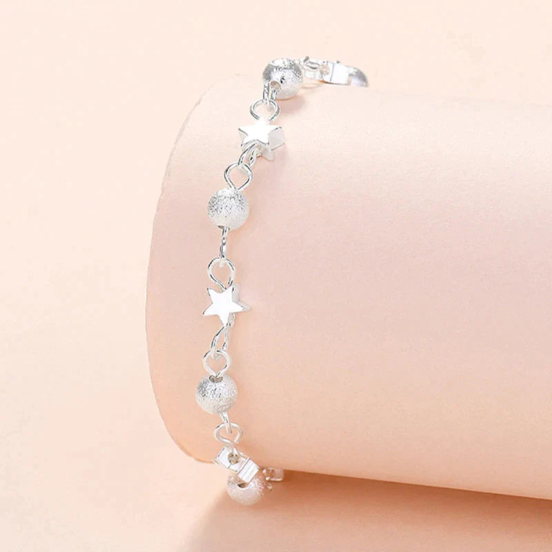 Damen Armband mit Sternenanhängern