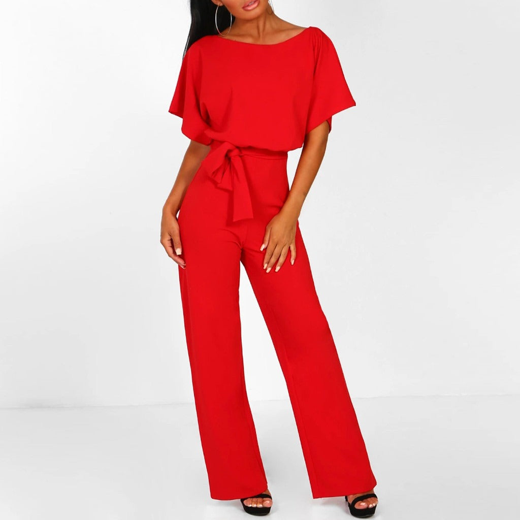 Elegante tuta da donna con accentuazione della vita e scollo rotondo