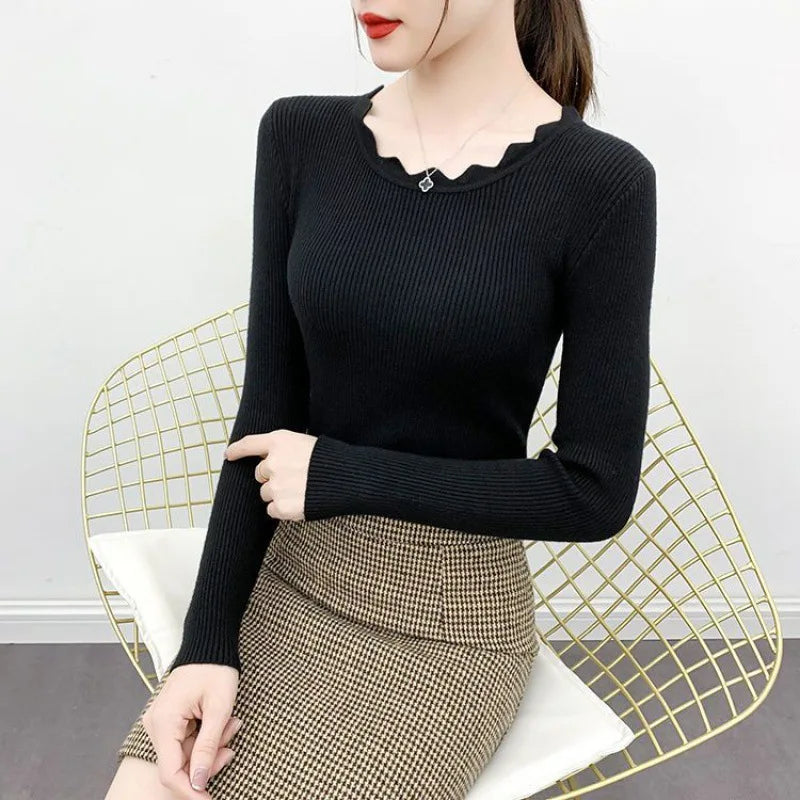 Elegante maglia da donna con maniche lunghe e scollo rotondo