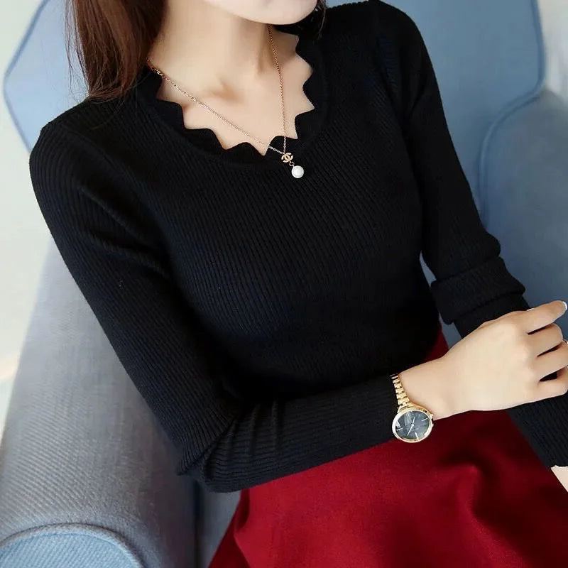 Elegante maglia da donna con maniche lunghe e scollo rotondo