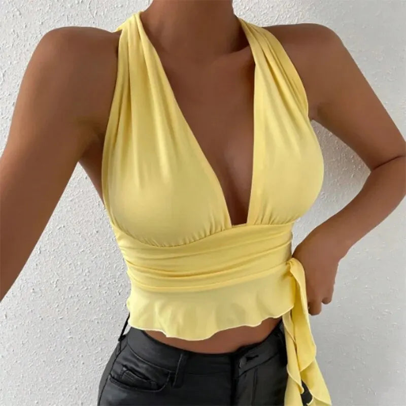 Elegant women's top with deep V-neck and pleats