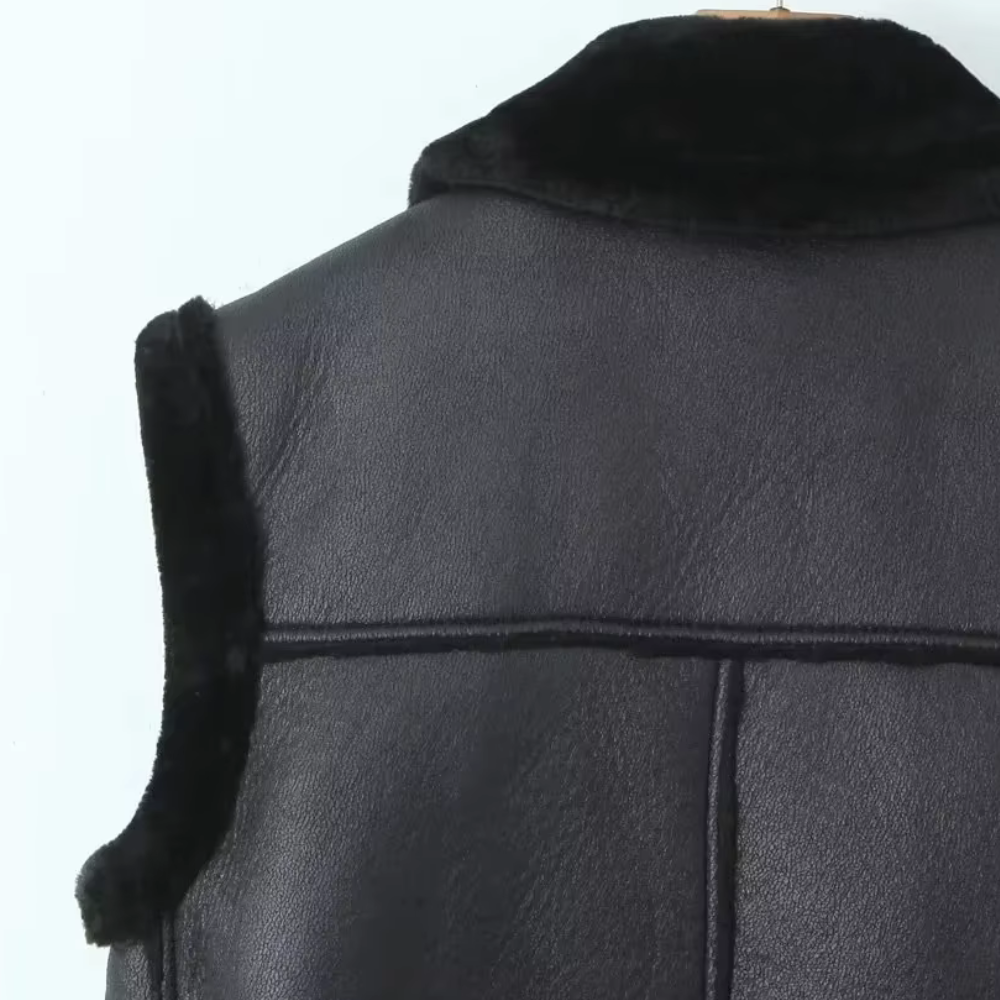 Women's vest made of faux leather with faux shearling lining