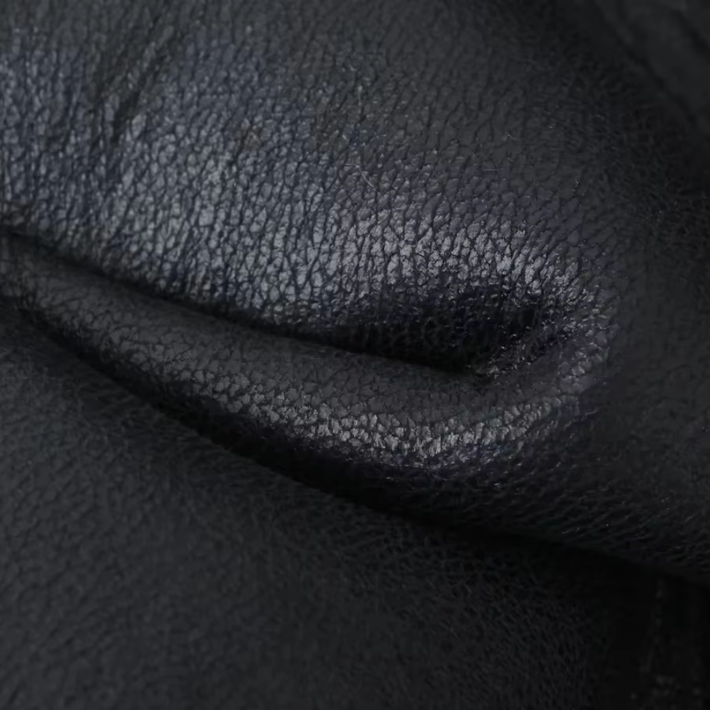 Women's vest made of faux leather with faux shearling lining