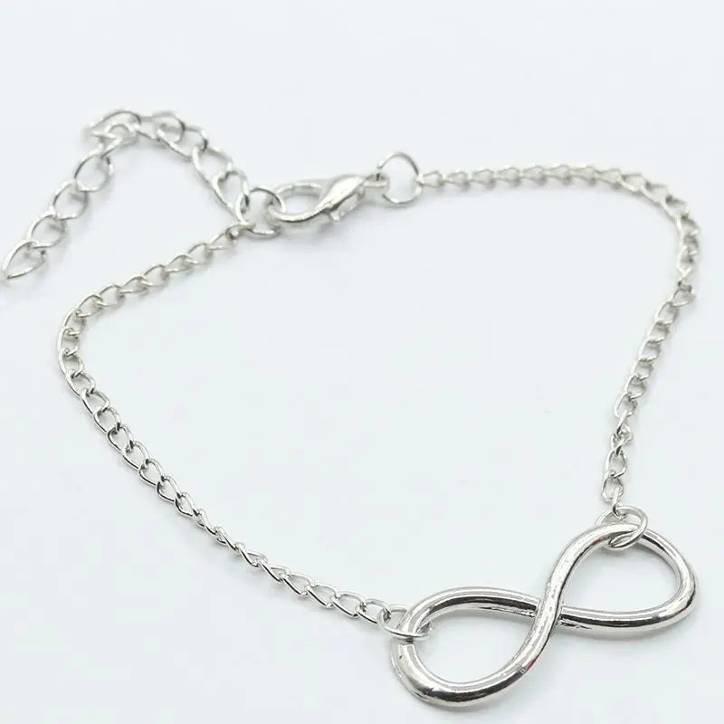 Modisches Infinity-Armband für Damen und Herren in und