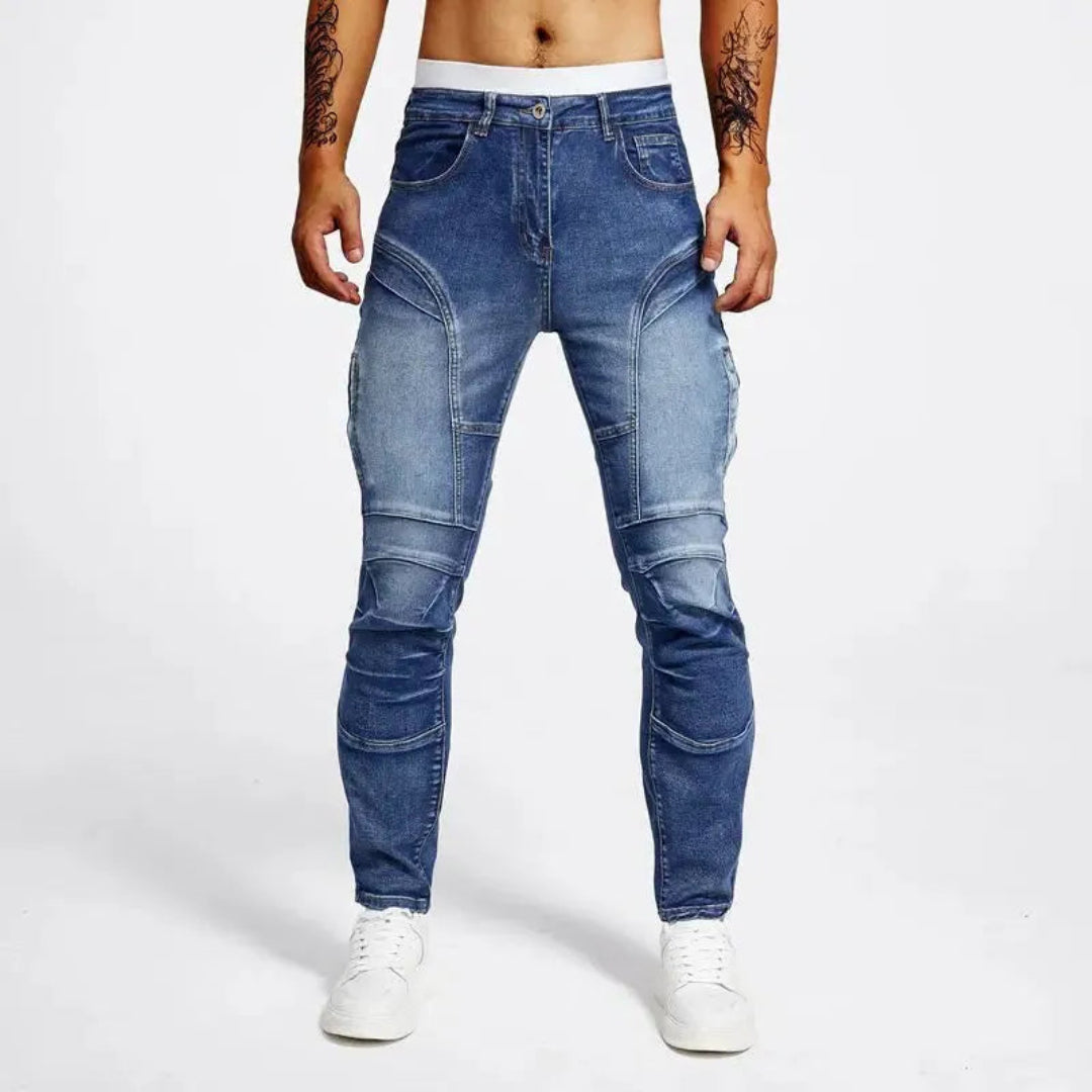 Jeans Moto de corte ajustado en denim elástico premium con costuras de panel