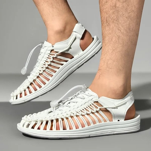 https://cdn.shopify.com/s/files/1/0844/6001/1865/files/atmungsaktive-strandsandalen-ganztagiger-komfort-Weiss.jpg?v=1738498500