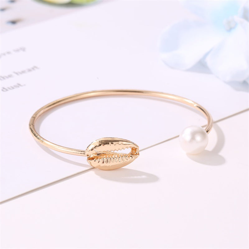 Damen Armreif mit Perle und Muschel – Filigranes Design in Gold- und Silberoptik, Ideal für Sommer- und Strandmode 4
