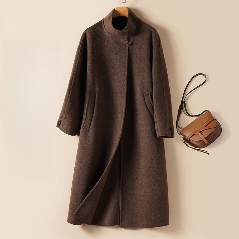 Long wool coat made of premium wool with modern collar cutout
