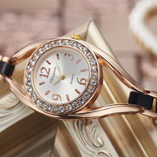 Damen Armbanduhr mit Strass Verzierungen 2