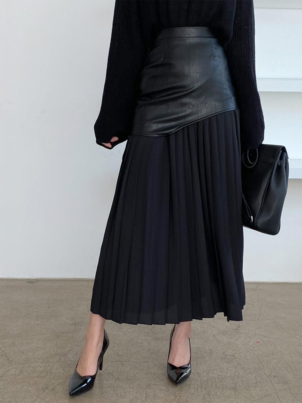 Asymmetrical skirt made of imitation leather and chiffon