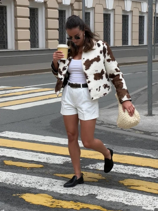Elegant women's jacket with cow pattern