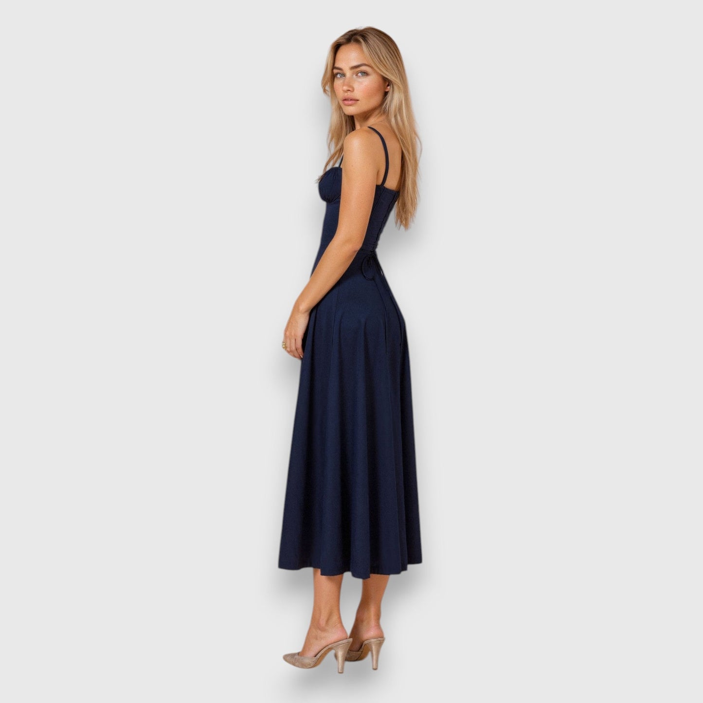 Elegant corset dress with midi length and flowing skirt