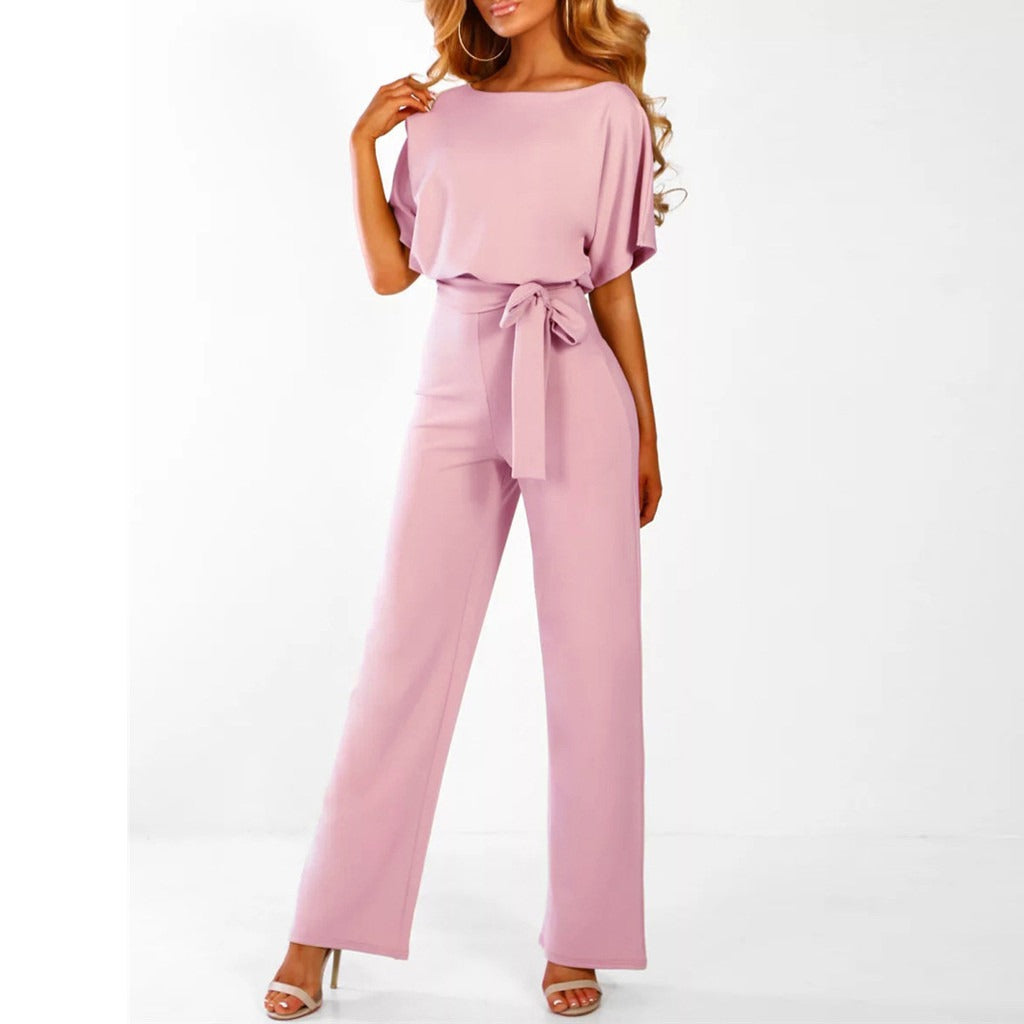 Elegante tuta da donna con accentuazione della vita e scollo rotondo