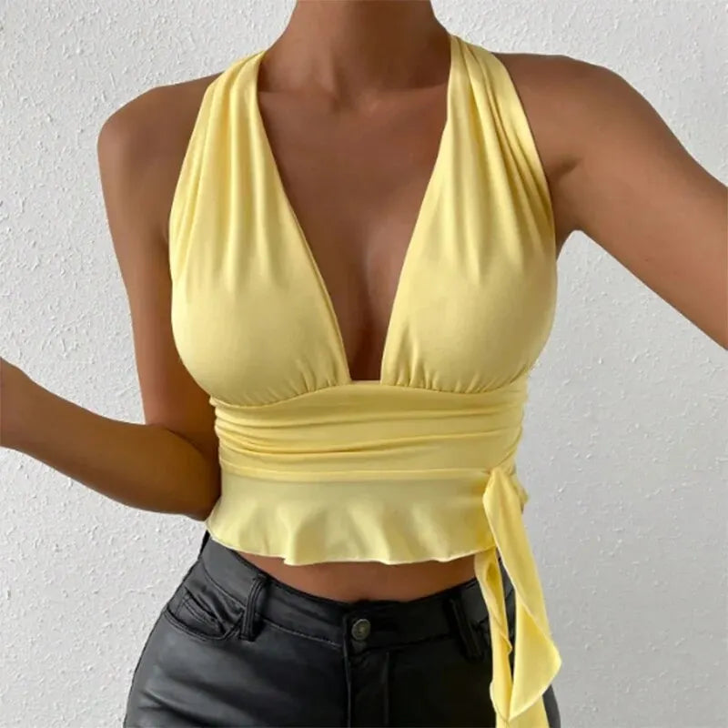 Elegant women's top with deep V-neck and pleats