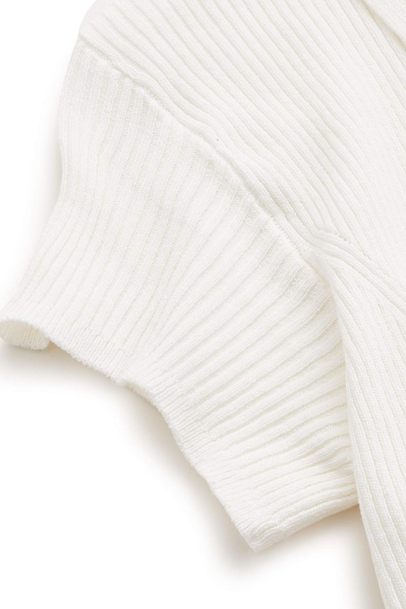 Knitted polo shirt women with polo collar and button placket