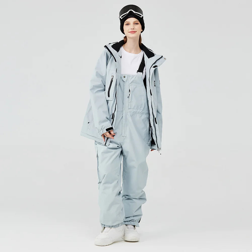 Tuta da sci impermeabile per donna con pantaloni a bretelle