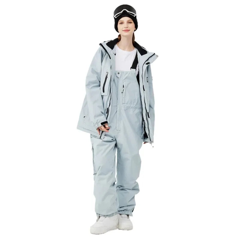 Tuta da sci impermeabile per donna con pantaloni a bretelle