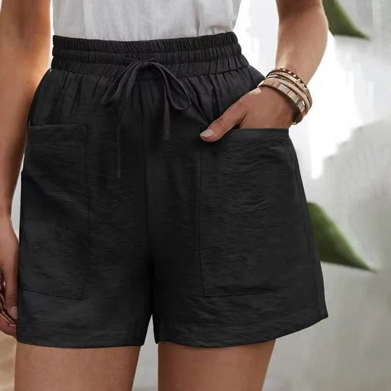 Avslappnade linne-shorts för kvinnor med elastisk midja och framfickor