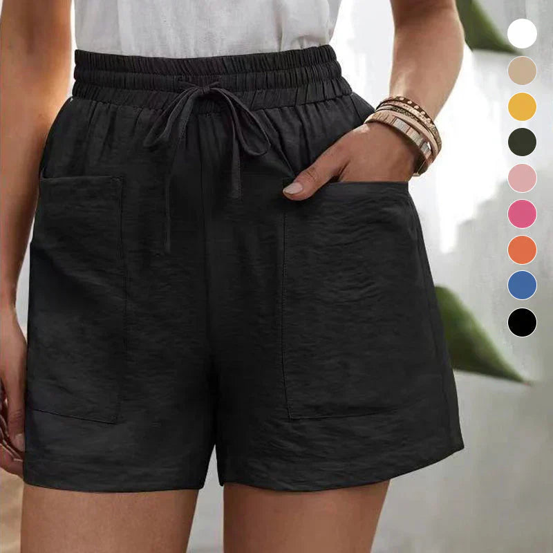 Avslappnade linne-shorts för kvinnor med elastisk midja och framfickor