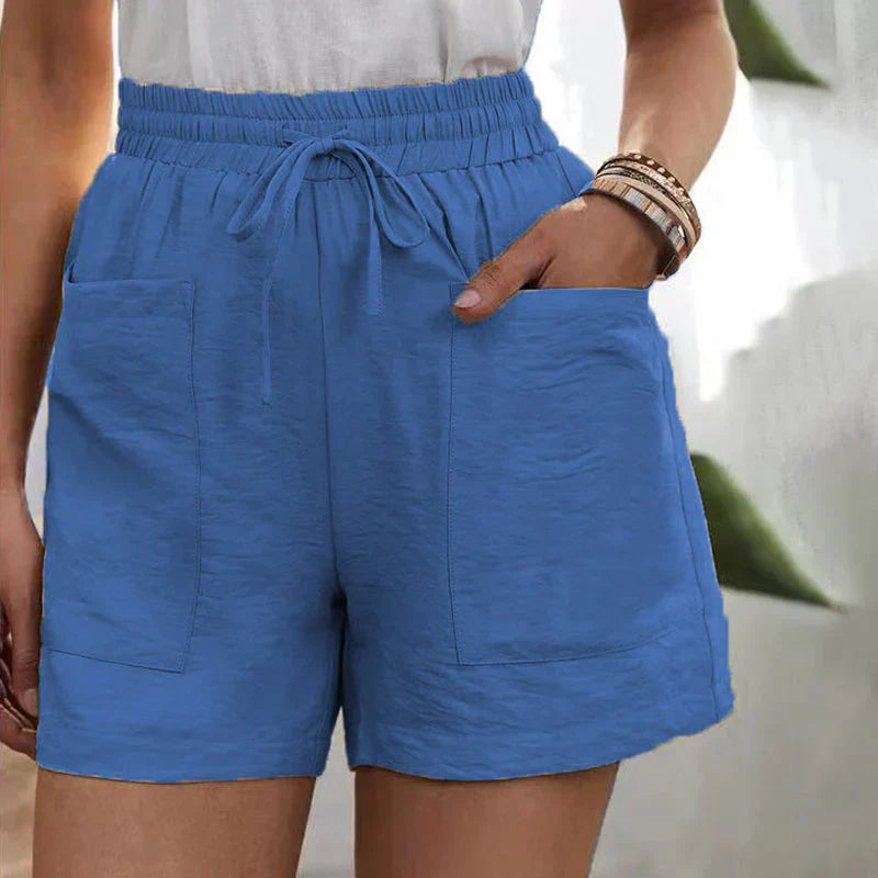 Avslappnade linne-shorts för kvinnor med elastisk midja och framfickor