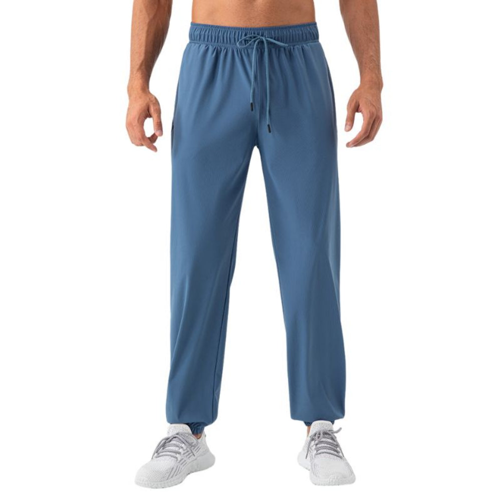 https://cdn.shopify.com/s/files/1/0844/6001/1865/files/bequeme-aktive-sommerhosen-maenner-Blau.jpg?v=1741348441