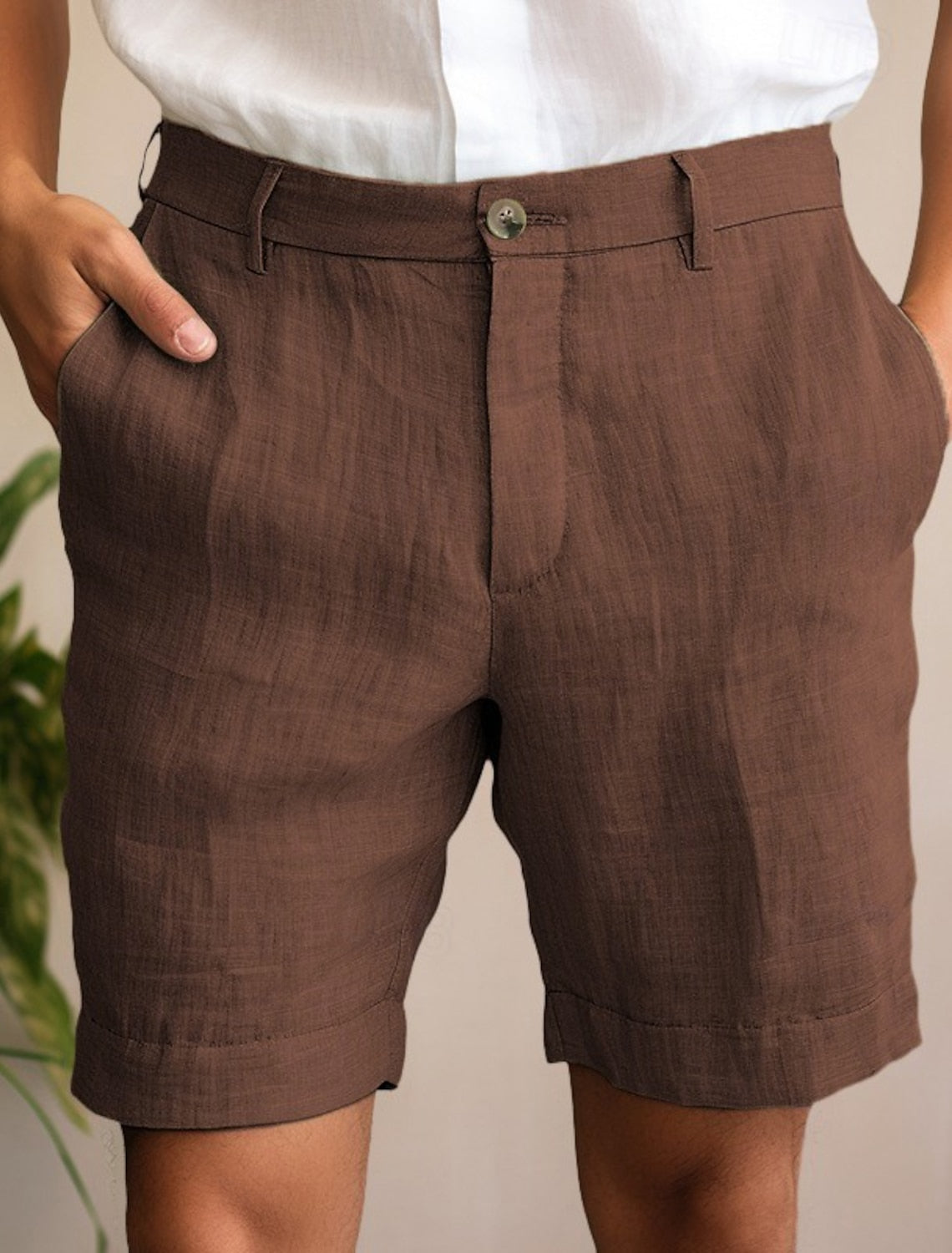 https://cdn.shopify.com/s/files/1/0844/6001/1865/files/trendige-leinen-shorts-sommer-maenner-Braun.jpg?v=1737374615